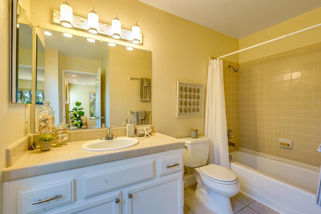 425 Canon Del Sol La Selva Beach, CA 95076 - Photo 27 of 59 a bathroom with a double vanity sink toilet mirror and bathtub