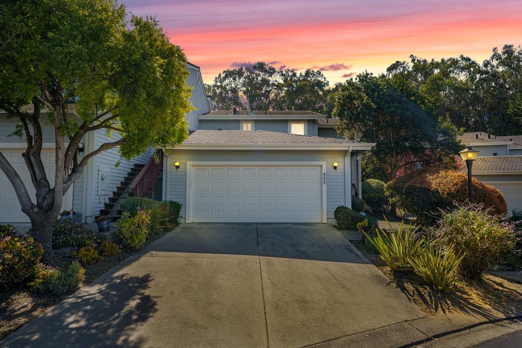 425 Canon Del Sol La Selva Beach, CA 95076 - Photo 56 of 59 a front view of a house with a yard and garage