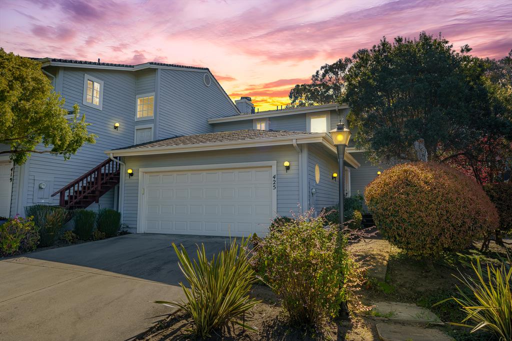 425 Canon Del Sol La Selva Beach, CA 95076 - Photo 58 of 59 a front view of a house with a yard and garage