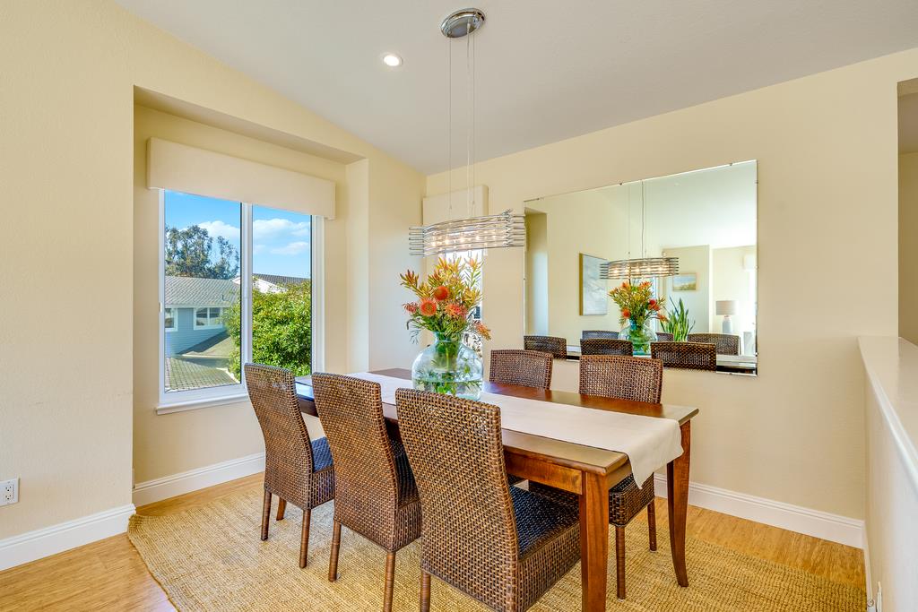 425 Canon Del Sol La Selva Beach, CA 95076 - Photo 10 of 59 a view of a dining room with furniture window and wooden floor