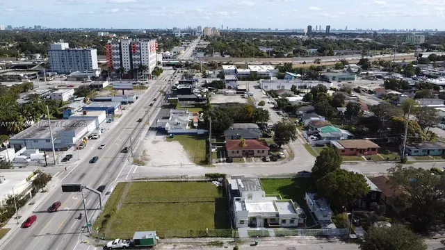 an aerial view of a city with lots of residential buildings