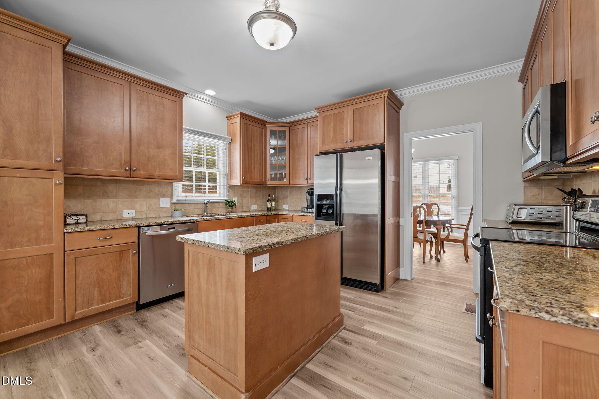 7511 Kristen Drive Oak Ridge, NC 27310 - Photo 11 of 50 Large kitchen with stainless steele appliances and granite countertops!