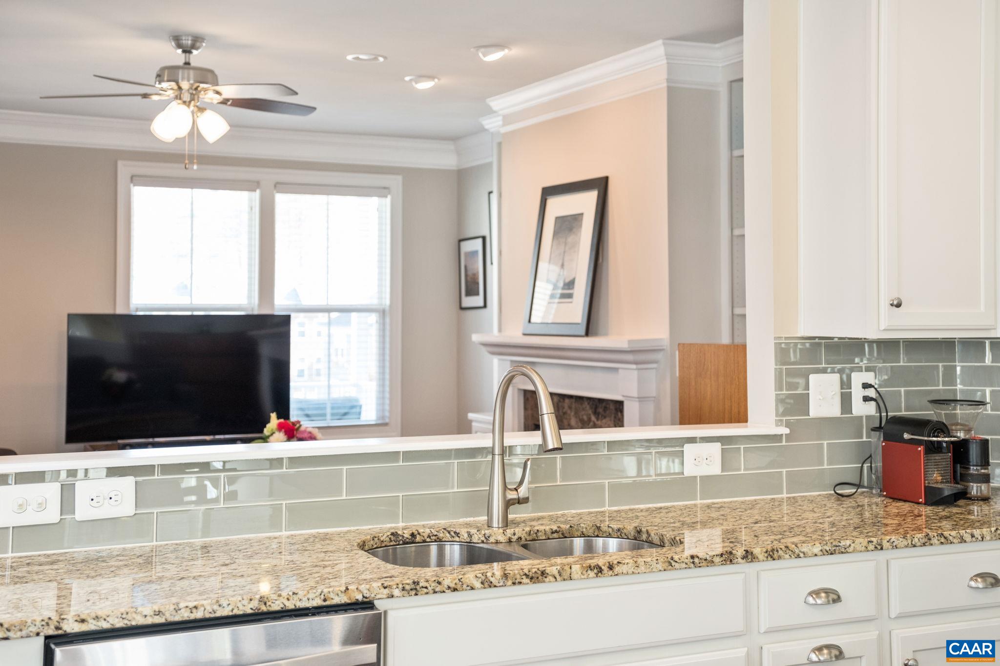2138 Avinity Loop Charlottesville, VA 22902 - Photo 13 of 49 a kitchen with stainless steel appliances granite countertop a sink and a microwave