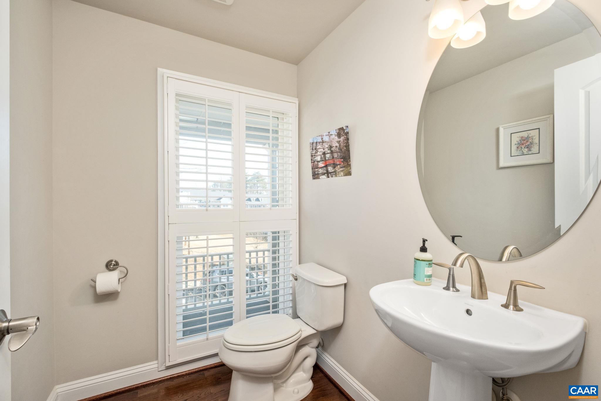 2138 Avinity Loop Charlottesville, VA 22902 - Photo 21 of 49 a bathroom with a sink toilet and a mirror