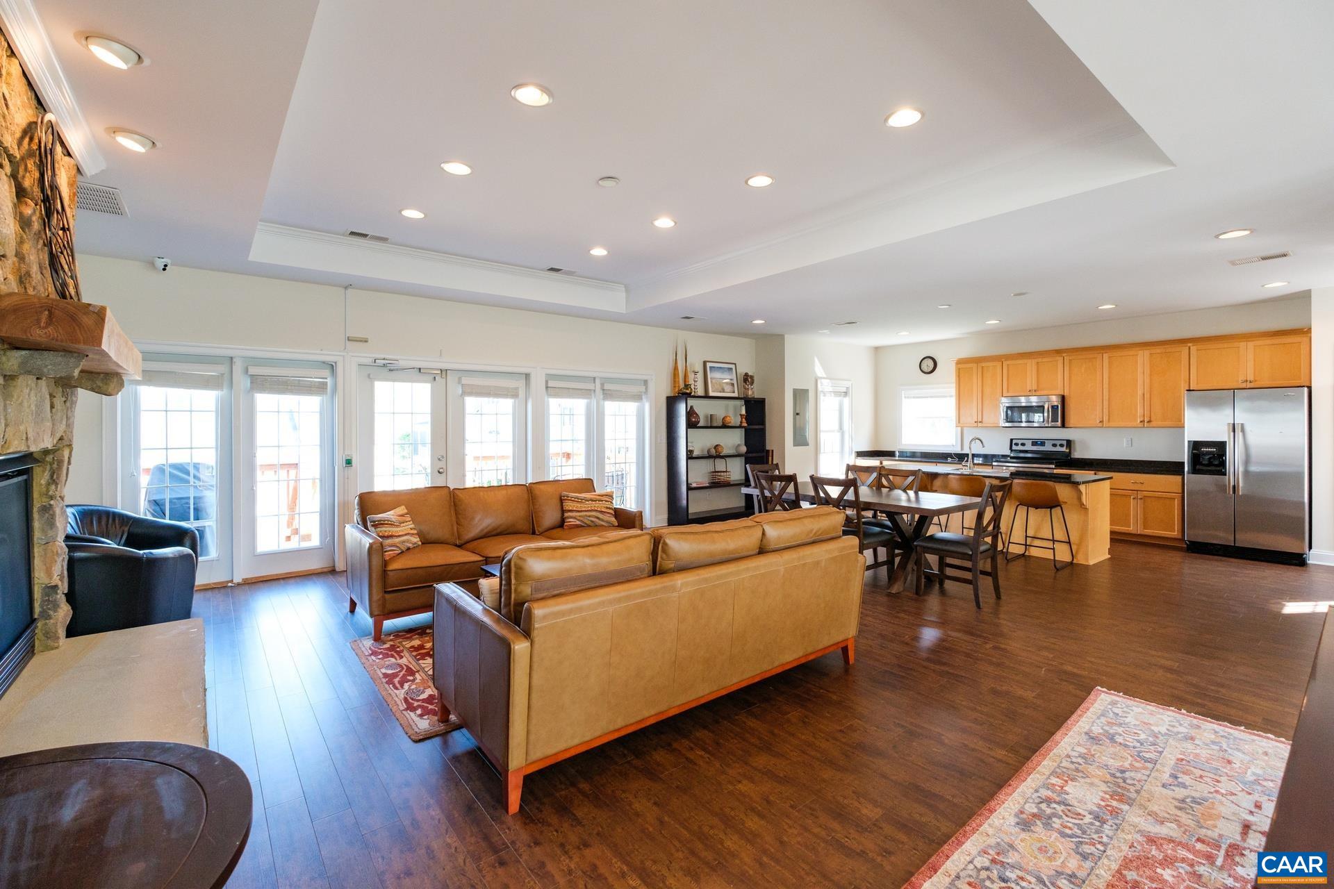2138 Avinity Loop Charlottesville, VA 22902 - Photo 40 of 49 a living room with furniture and wooden floor