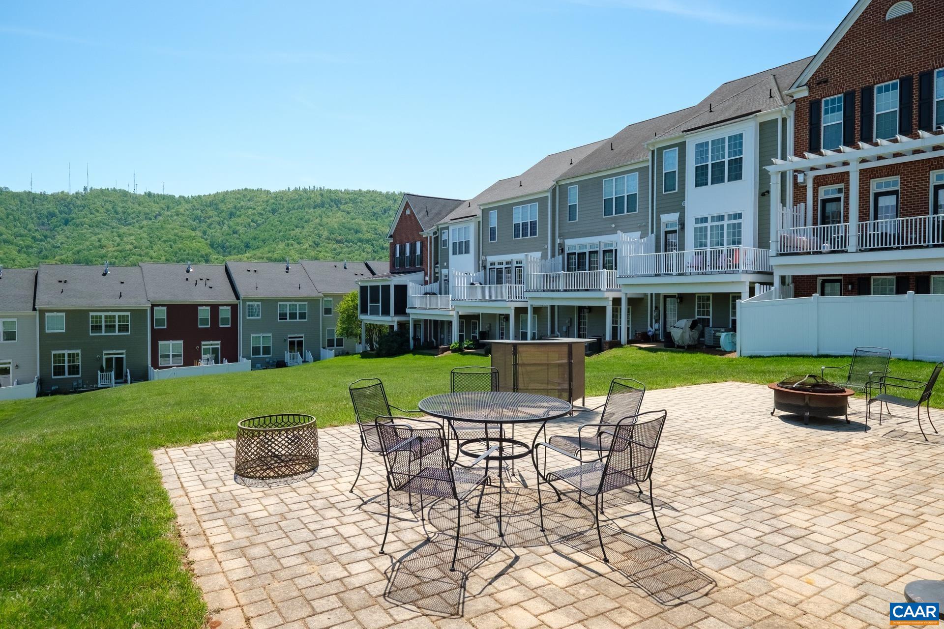 2138 Avinity Loop Charlottesville, VA 22902 - Photo 42 of 49 a view of a house with backyard sitting area and garden
