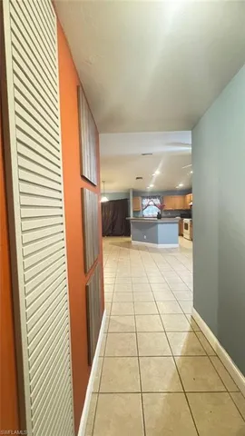 a view of hallway with a couch