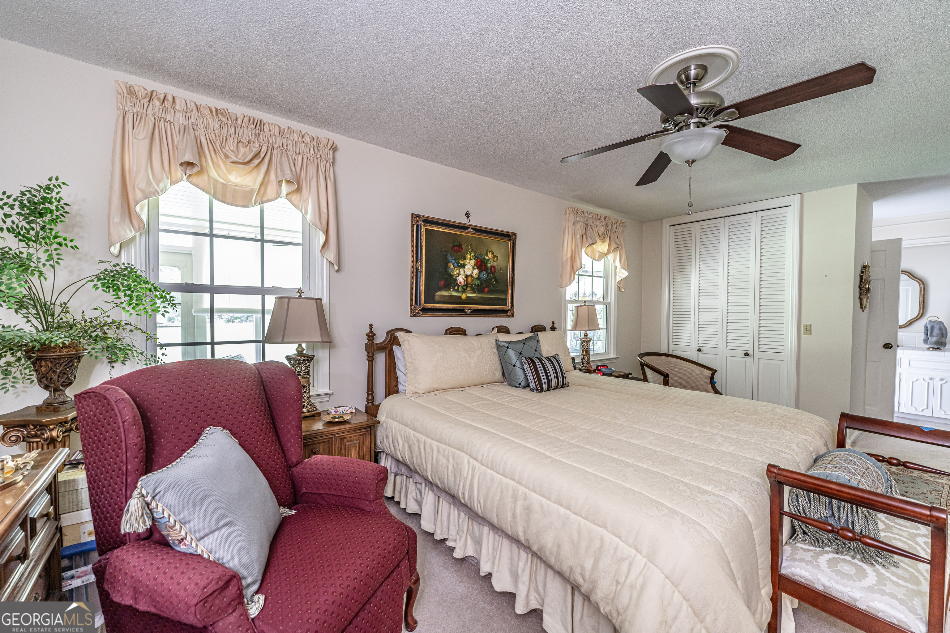 16 Cinnamon Lane Northeast Rome, GA 30161 - Photo 12 of 23 a bedroom with a bed couch and window