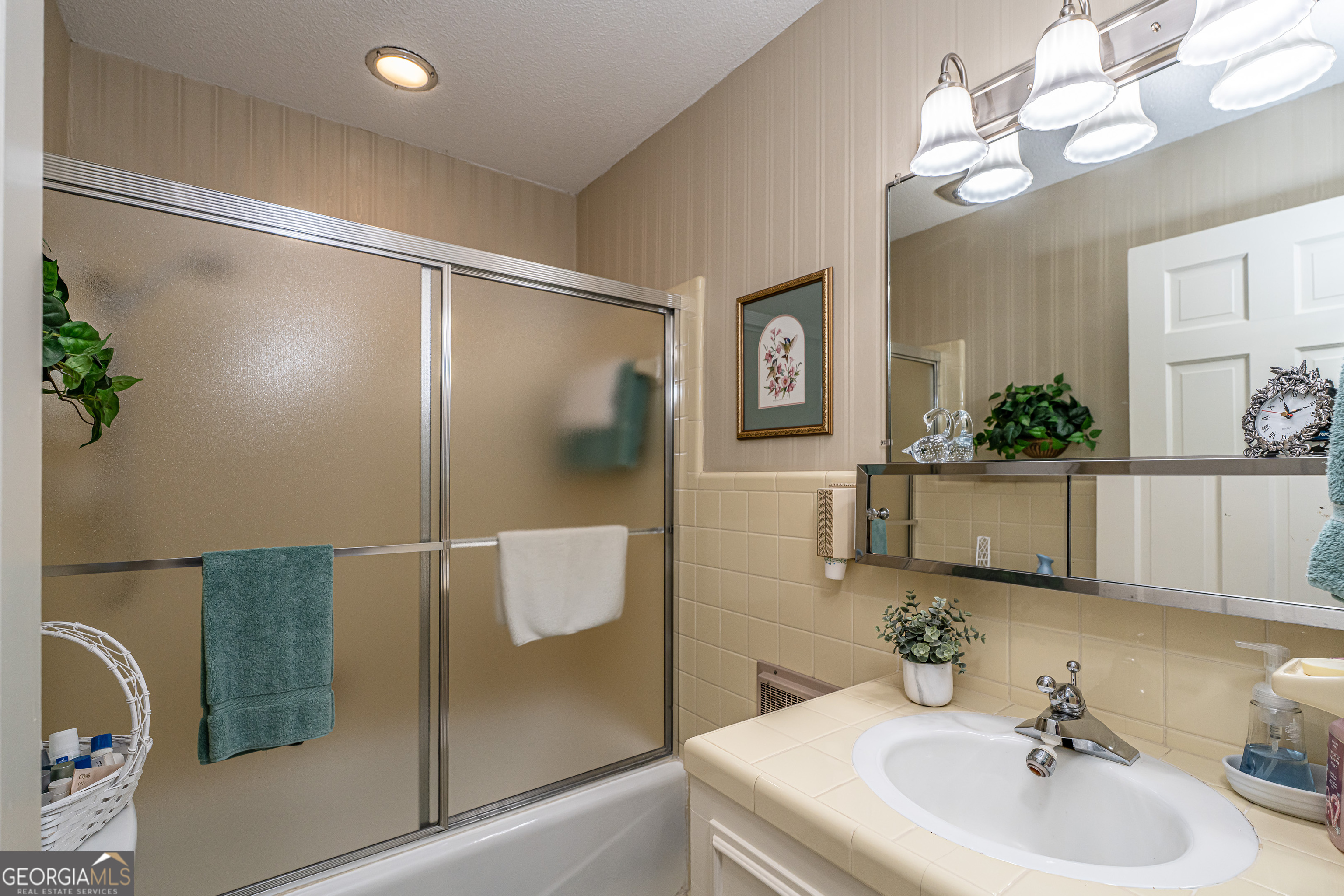 16 Cinnamon Lane Northeast Rome, GA 30161 - Photo 16 of 23 a bathroom with a sink mirror and vanity