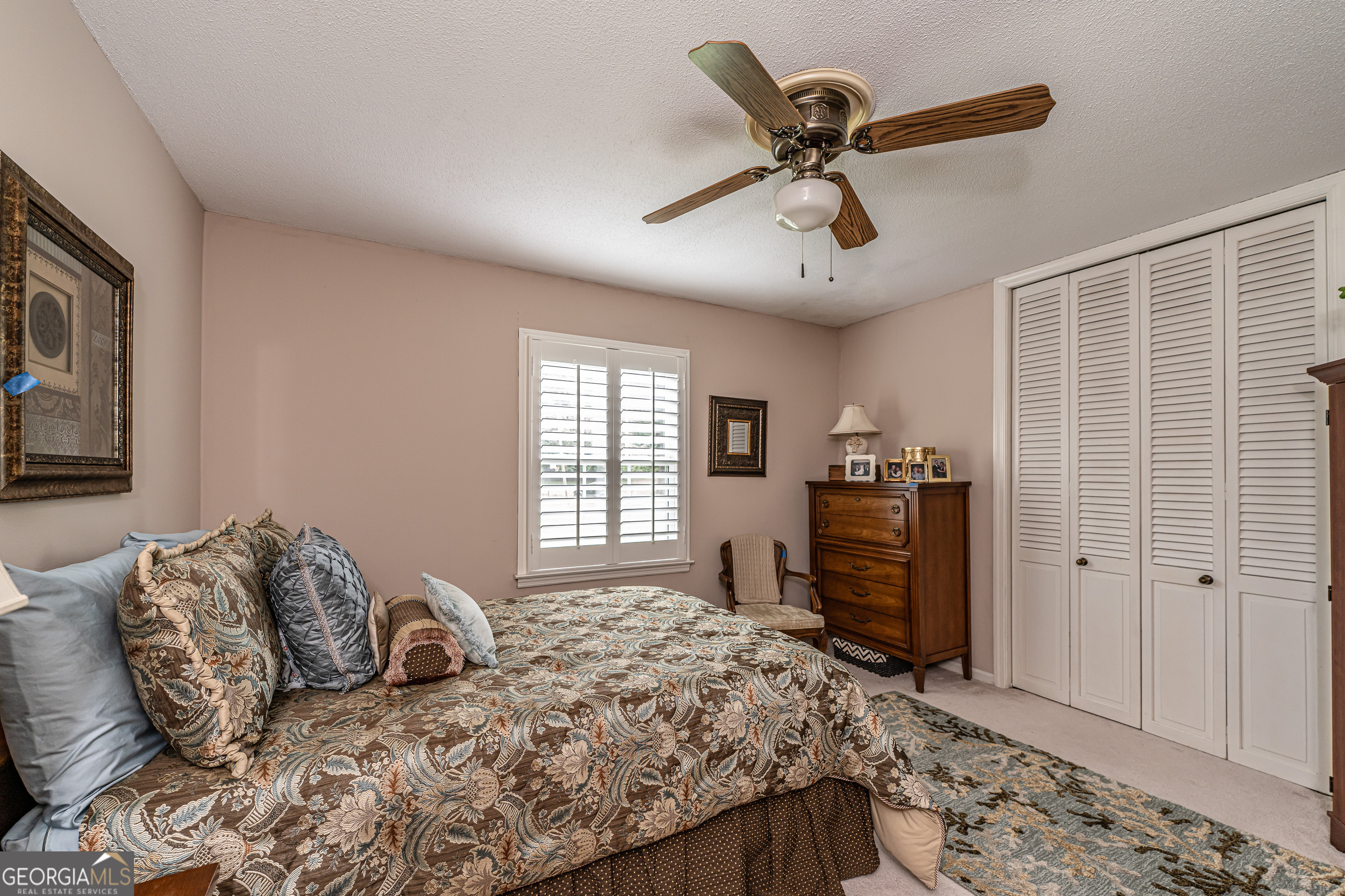 16 Cinnamon Lane Northeast Rome, GA 30161 - Photo 17 of 23 a bedroom with furniture window and a ceiling fan
