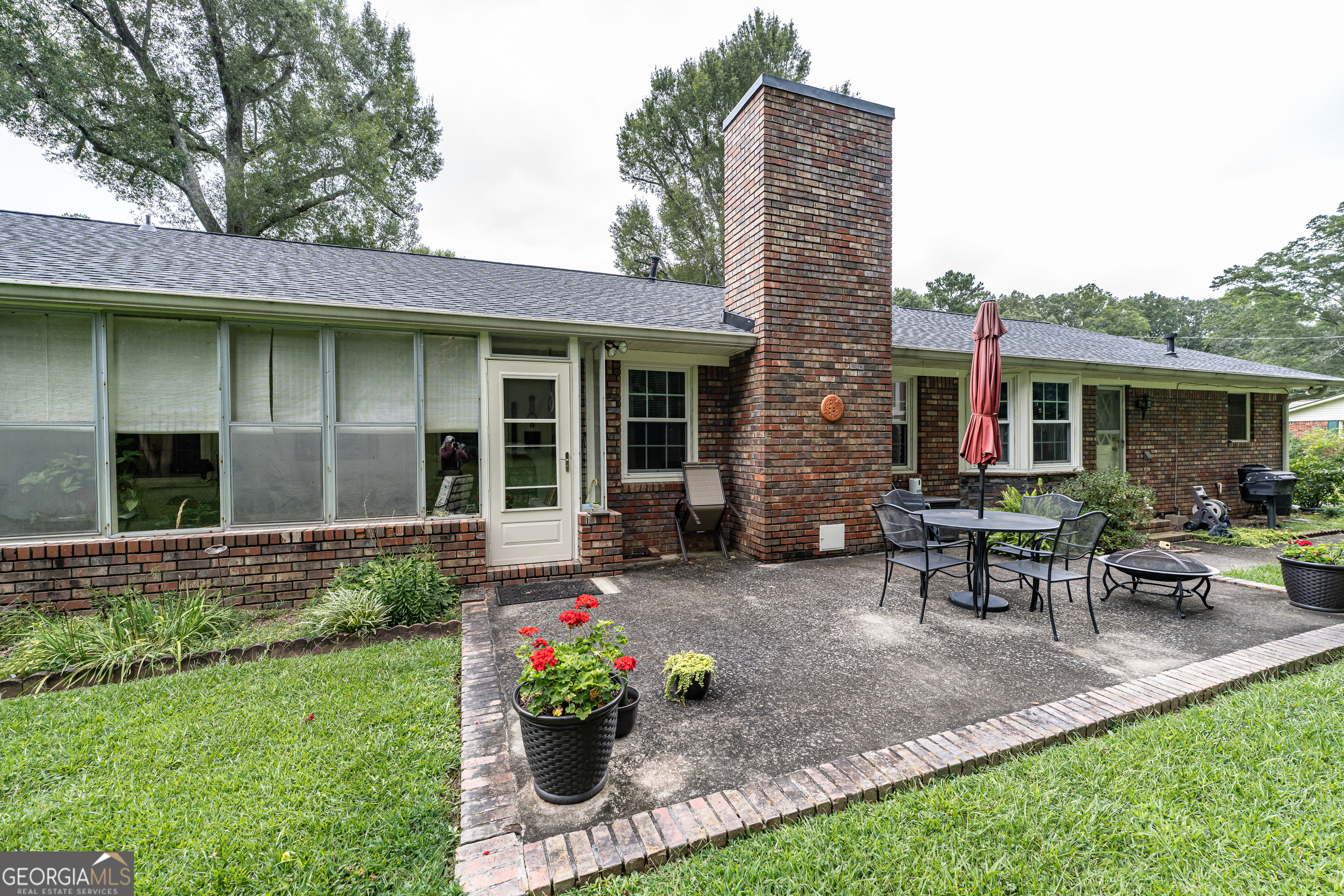 16 Cinnamon Lane Northeast Rome, GA 30161 - Photo 21 of 23 a view of a house with a yard and sitting area