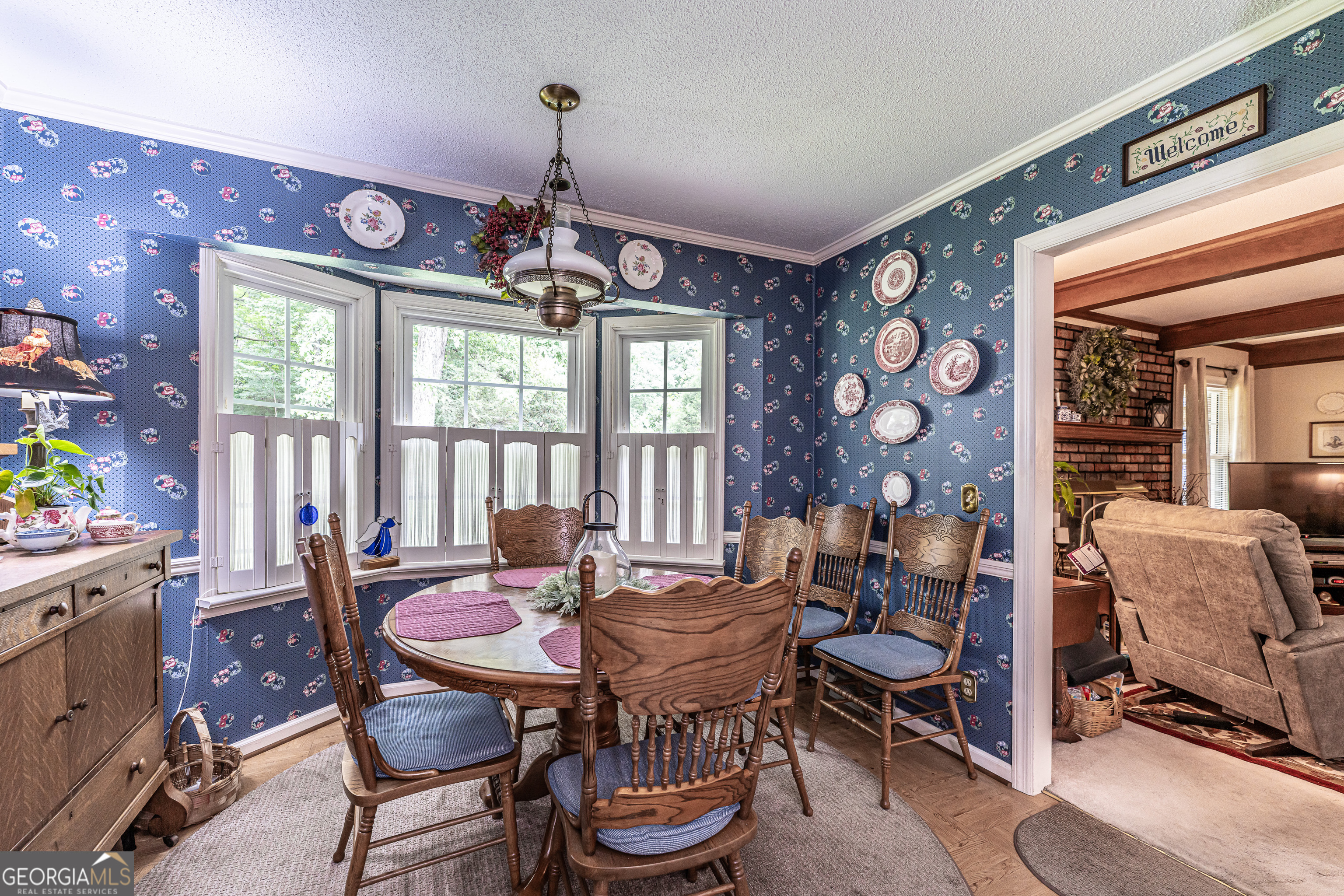16 Cinnamon Lane Northeast Rome, GA 30161 - Photo 9 of 23 a dining room with furniture a chandelier and window