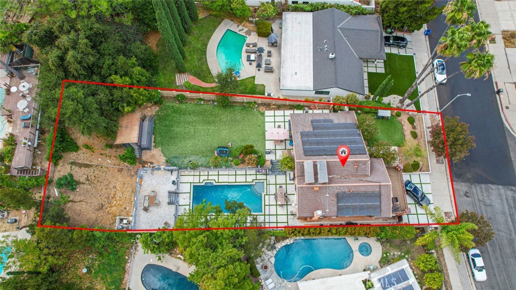 18810 Kirkcolm Lane Porter Ranch, CA 91326 - Photo 8 of 75 an aerial view of a house with a swimming pool