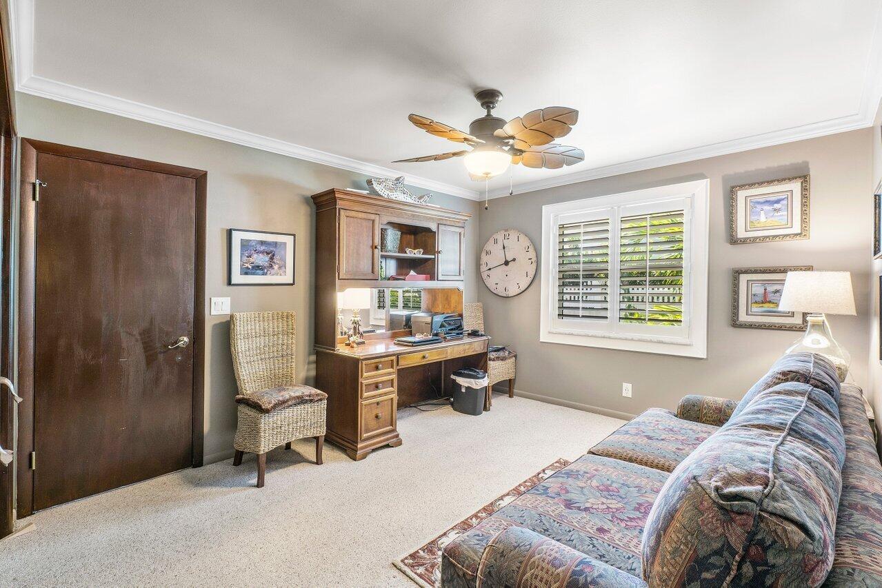 33 Ocean Drive Jupiter Inlet Colony, FL 33469 - Photo 26 of 30 a living room with furniture and a window
