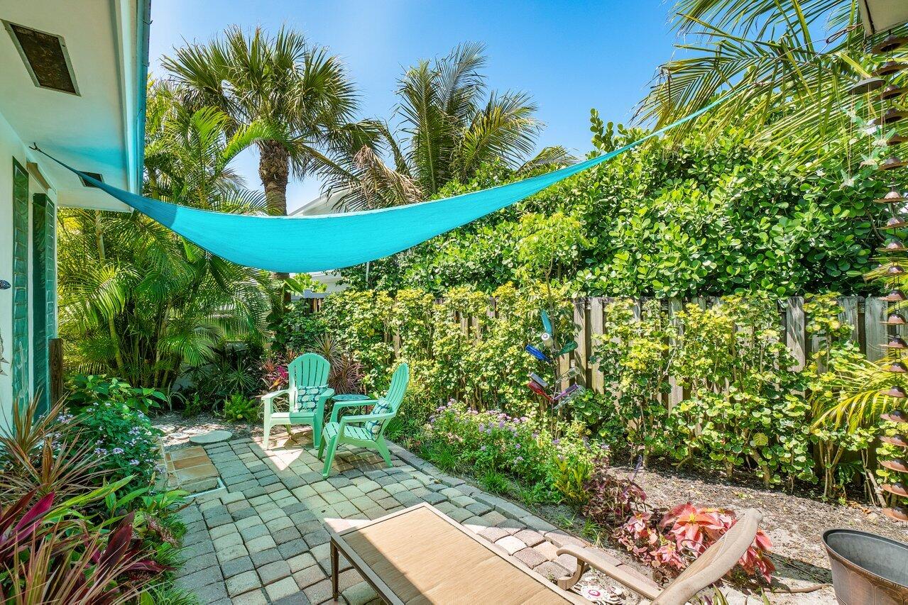 33 Ocean Drive Jupiter Inlet Colony, FL 33469 - Photo 29 of 30 a view of a chairs in a patio