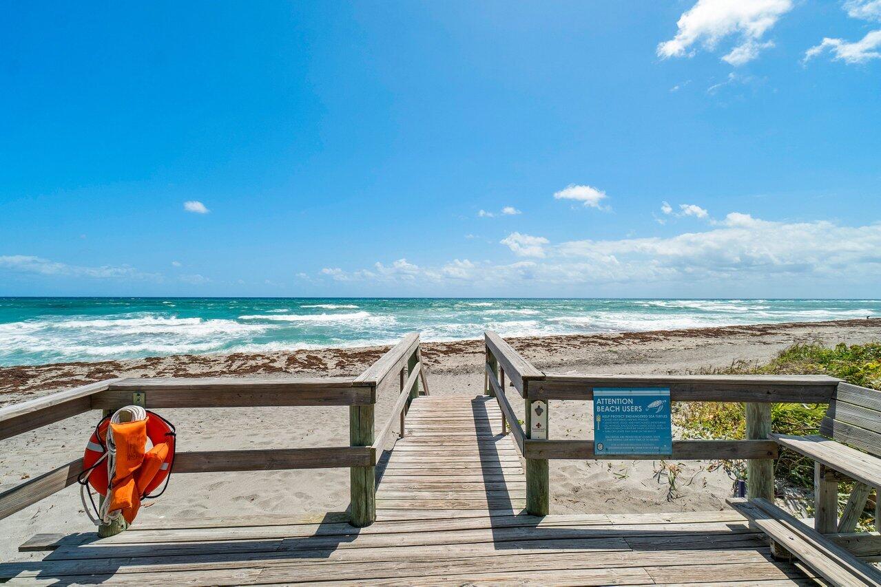 33 Ocean Drive Jupiter Inlet Colony, FL 33469 - Photo 8 of 30 wooden view of building with an outdoor space