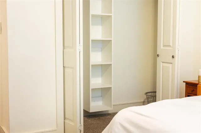 a view of a bathroom from the hallway