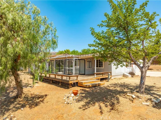 a view of a house with snow on the ground