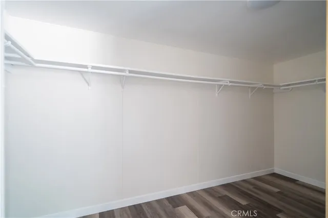 a view of an empty walk in closet