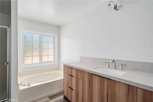 a bathroom with a sink and a bathtub