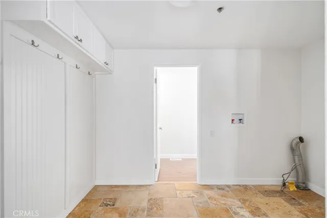 a view of a room with drop ceiling