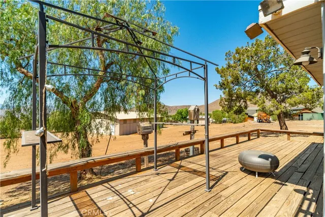 a view of a balcony with chairs