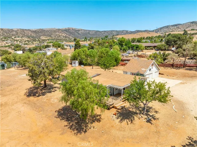 a view of a city with mountains in the background