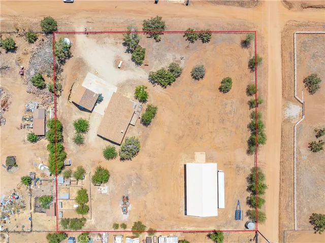 an aerial view of a house with a garden