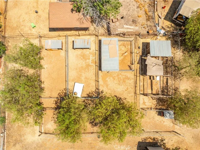 a view of a ocean with wooden fence