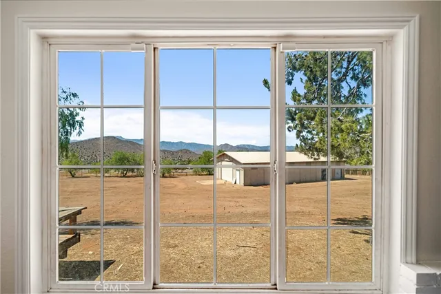 a view of a living room and window