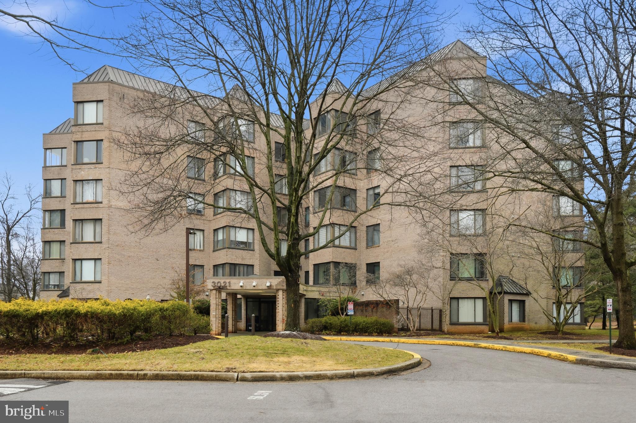 a view of a building with a yard