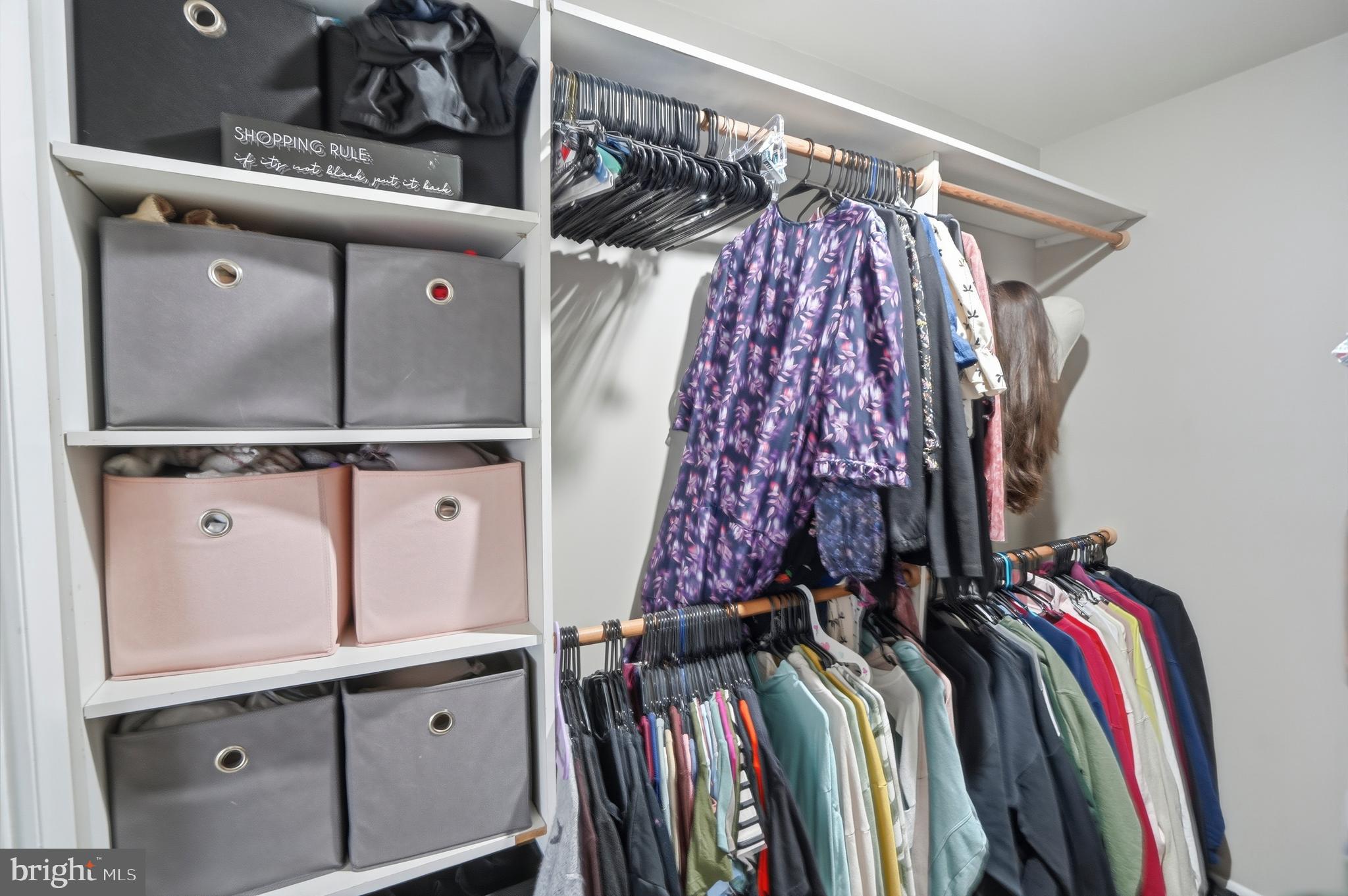 3021 Fallstaff Road, Unit 502B Baltimore, MD 21209 - Photo 23 of 39 a view of walk in closet with clothes and shoes
