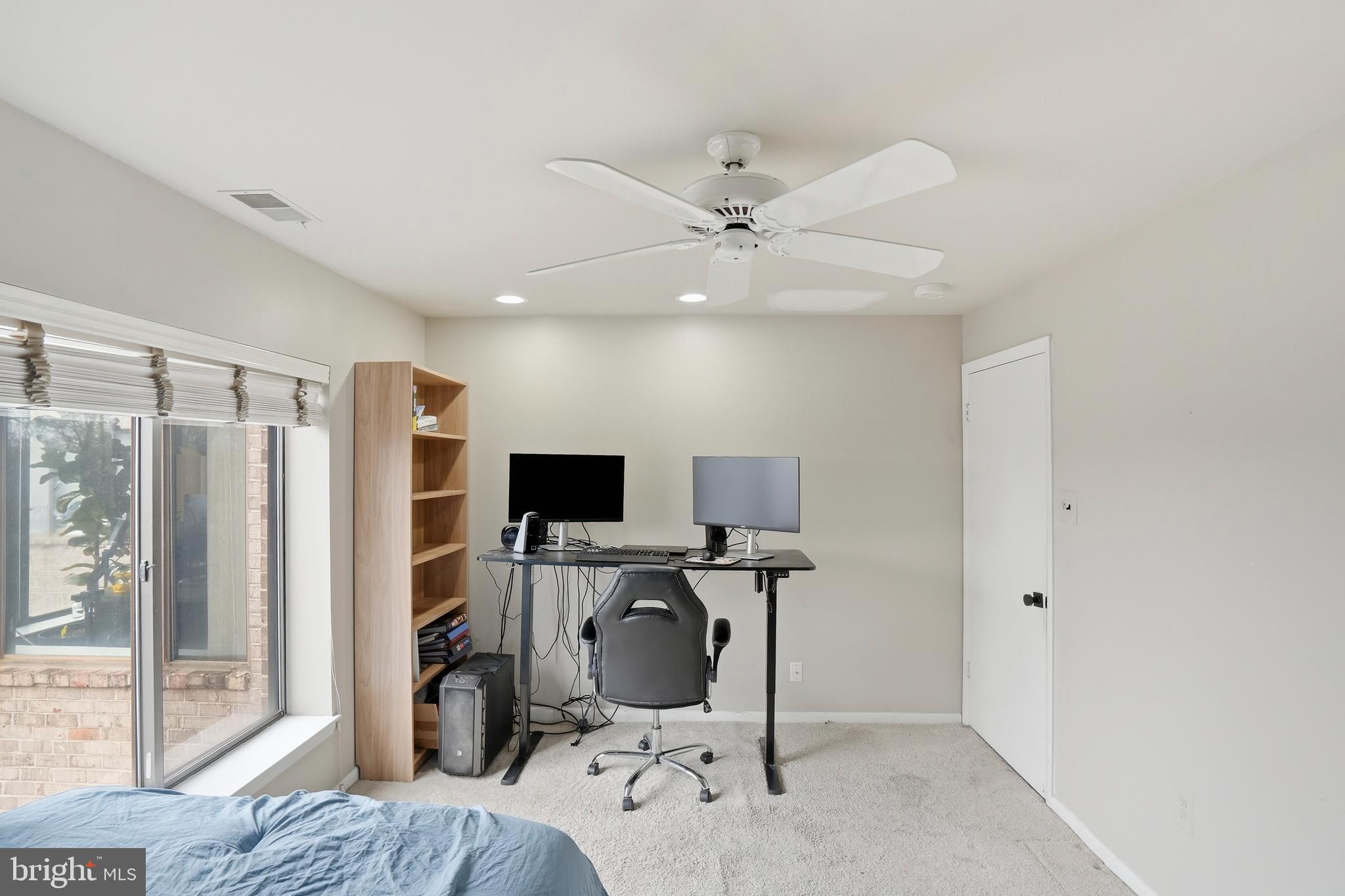 3021 Fallstaff Road, Unit 502B Baltimore, MD 21209 - Photo 26 of 39 a view of a livingroom with workspace and a window