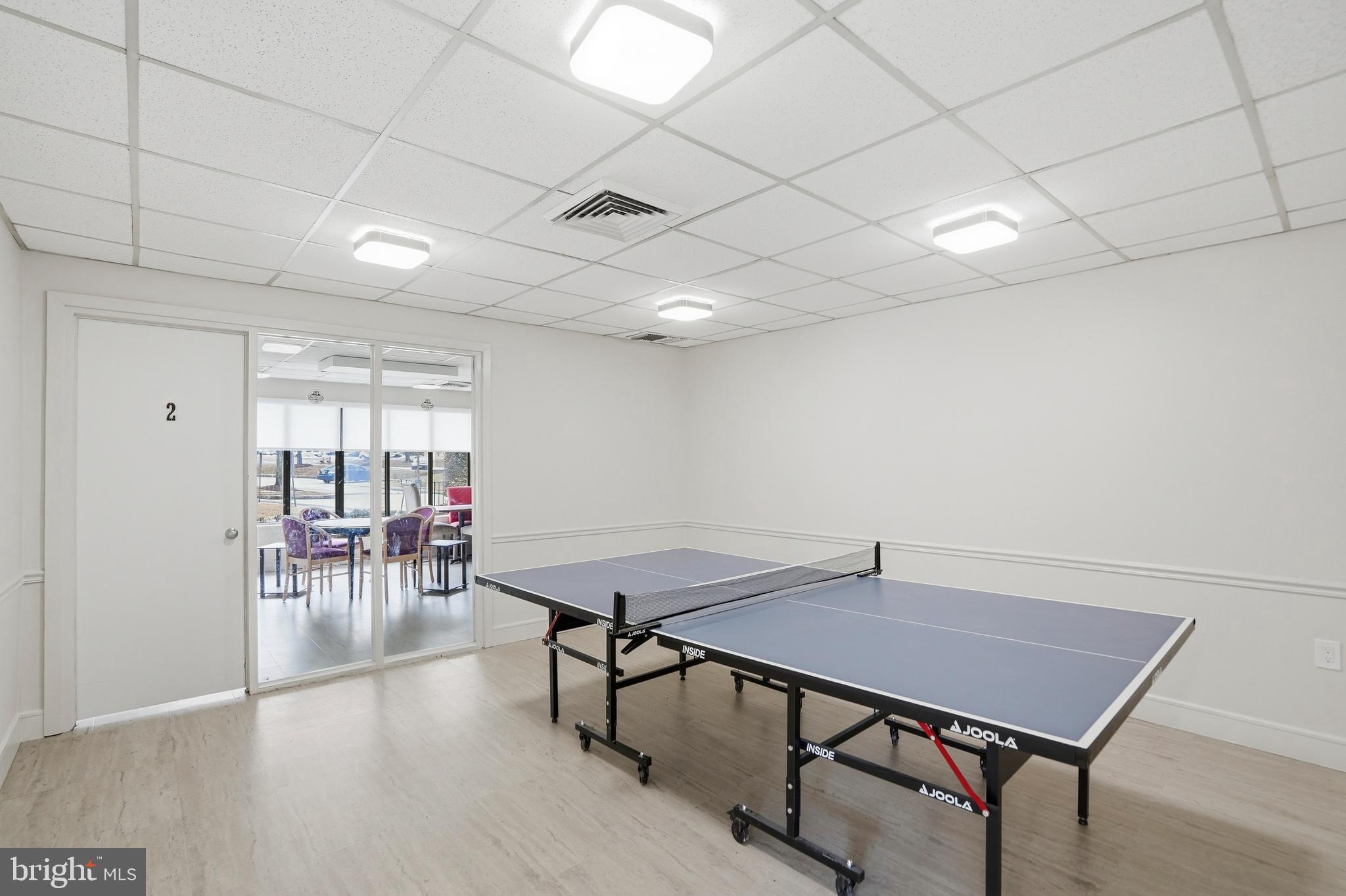 3021 Fallstaff Road, Unit 502B Baltimore, MD 21209 - Photo 33 of 39 a view of a room with furniture and wooden floor