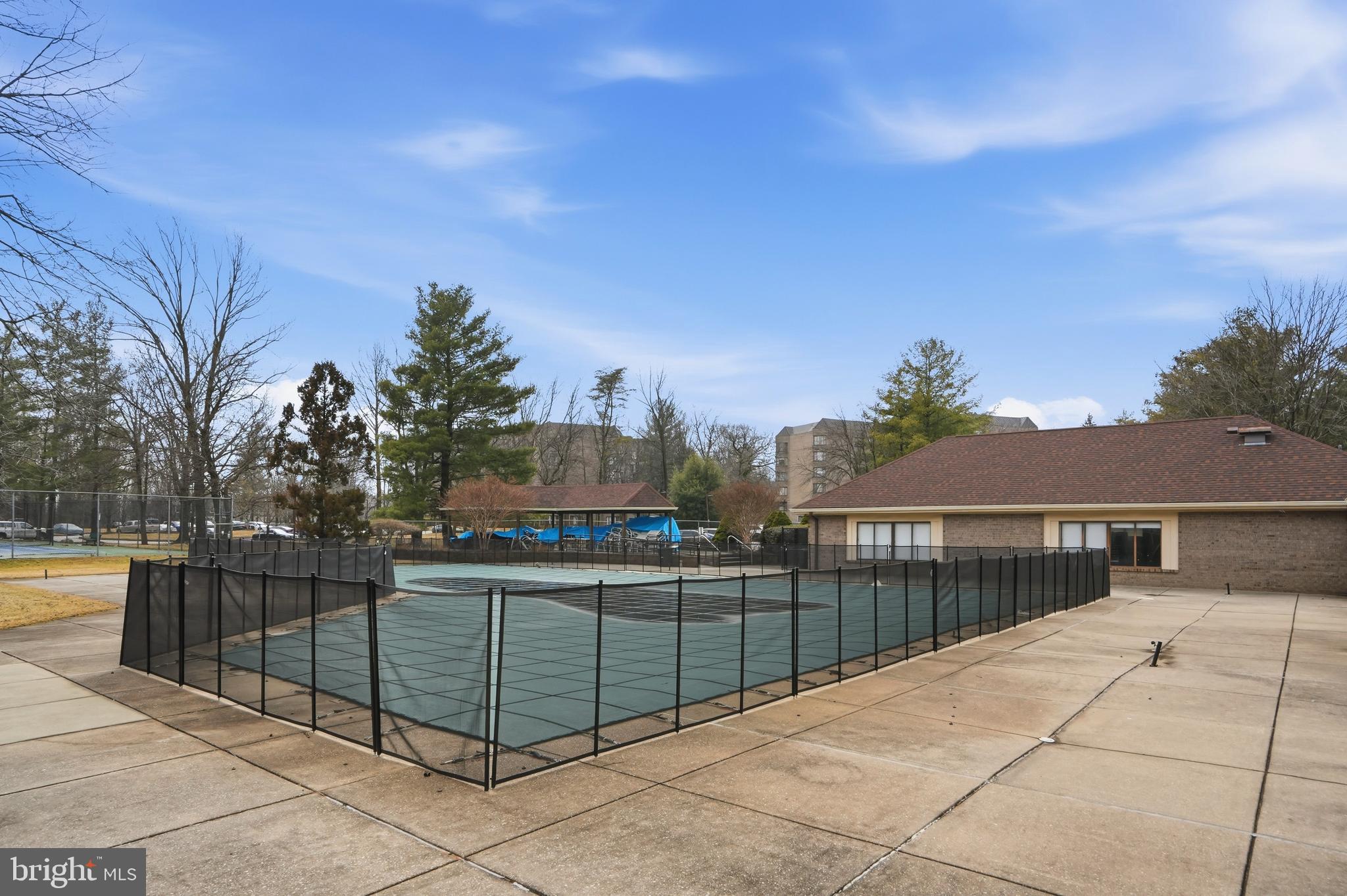 3021 Fallstaff Road, Unit 502B Baltimore, MD 21209 - Photo 37 of 39 a view of a house with a balcony