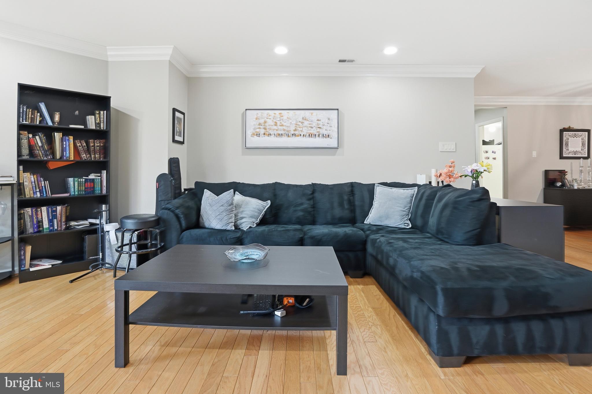 3021 Fallstaff Road, Unit 502B Baltimore, MD 21209 - Photo 6 of 39 a living room with furniture and a couch
