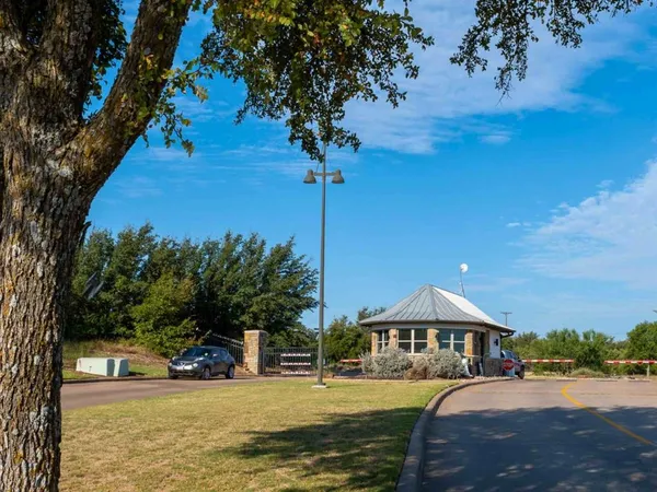 a view of a lake with a big yard