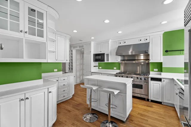 a utility room with cabinets