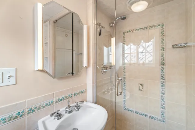a view of a kitchen with sink and washer