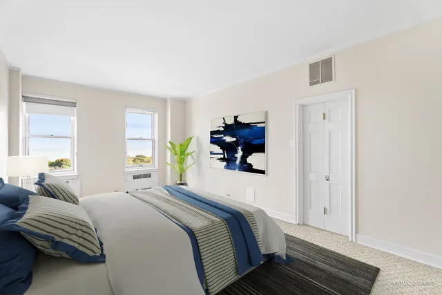 a bedroom with a bed and a book shelf