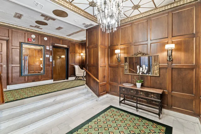 a bathroom with a tub and shower