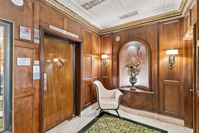 a living room with furniture fireplace and flat screen tv