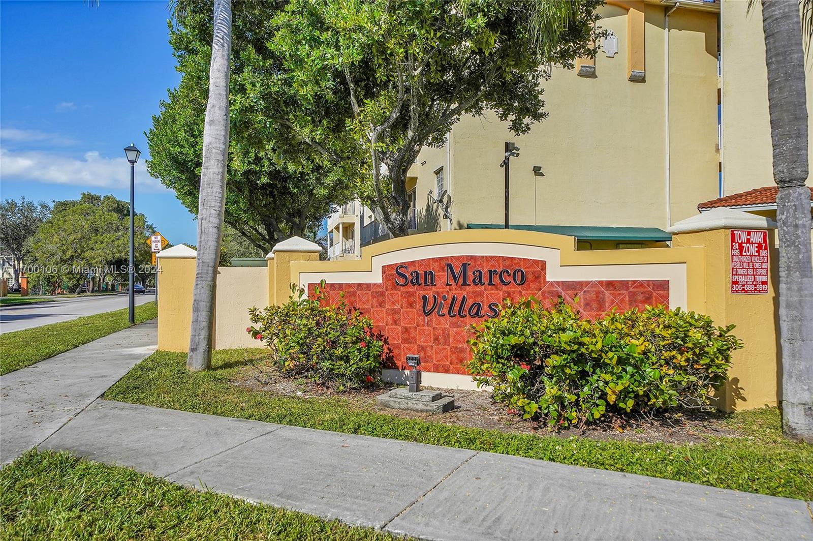 6940 Northwest 179th Street, Unit 3057 Hialeah, FL 33015 - Photo 2 of 32 a sign on the side of a building