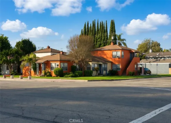 a view of a parked cars in front of a building