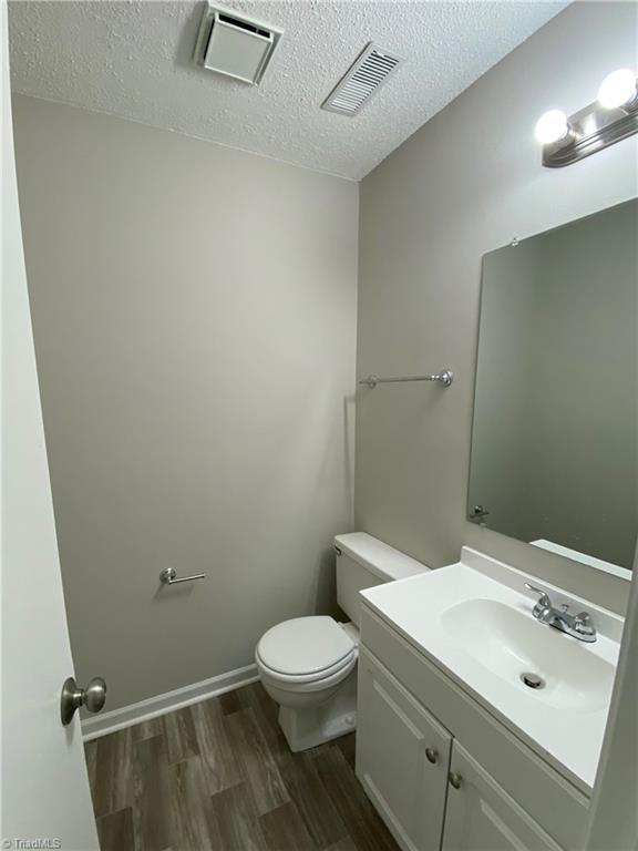 3221 Rockingham Road High Point, NC 27265 - Photo 15 of 18 Half Bathrrom with new flooring and vanity.