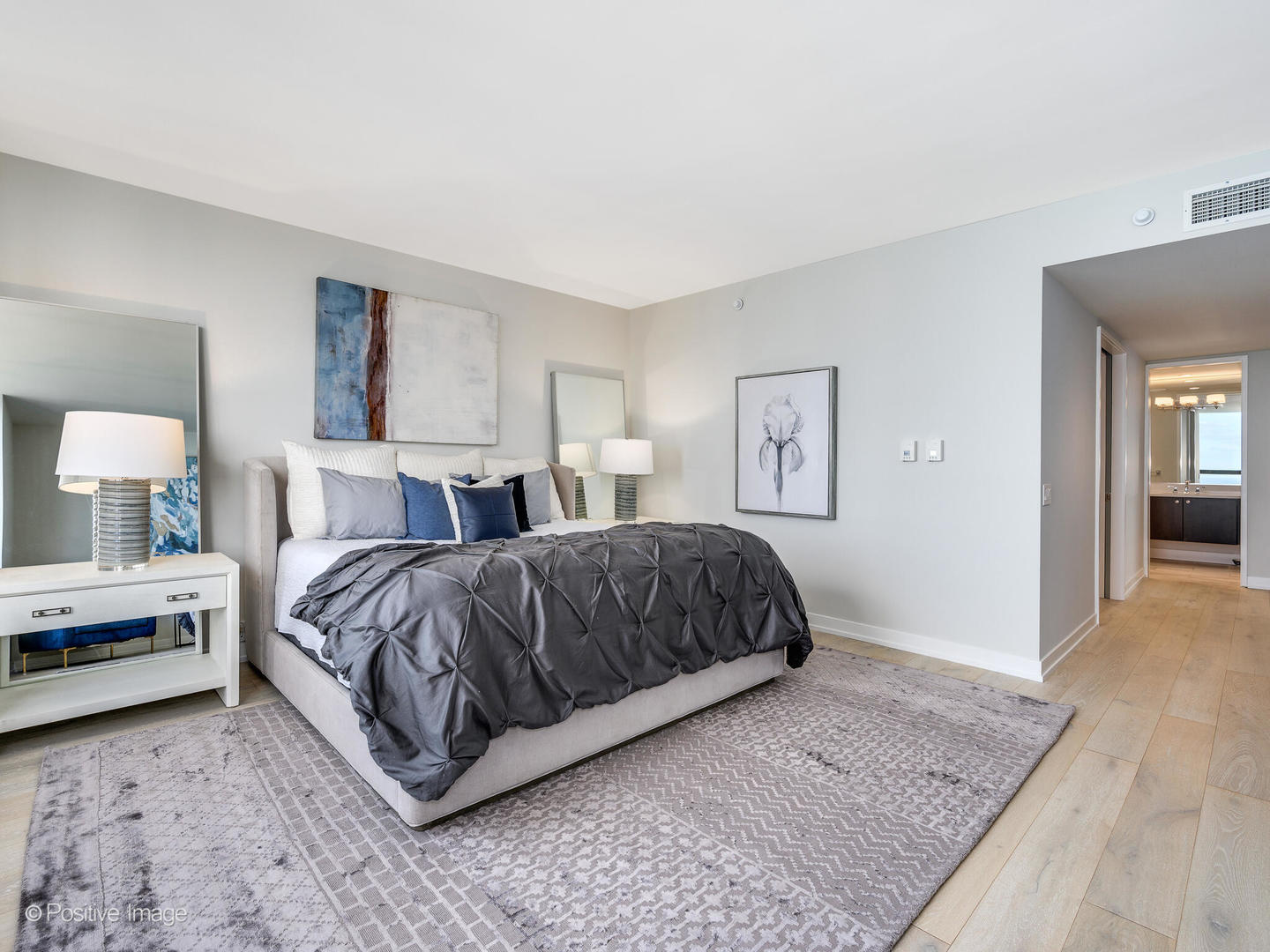 180 East Pearson Street, Unit 6501 Chicago, IL 60611 - Photo 20 of 35 a bedroom with a bed and closet