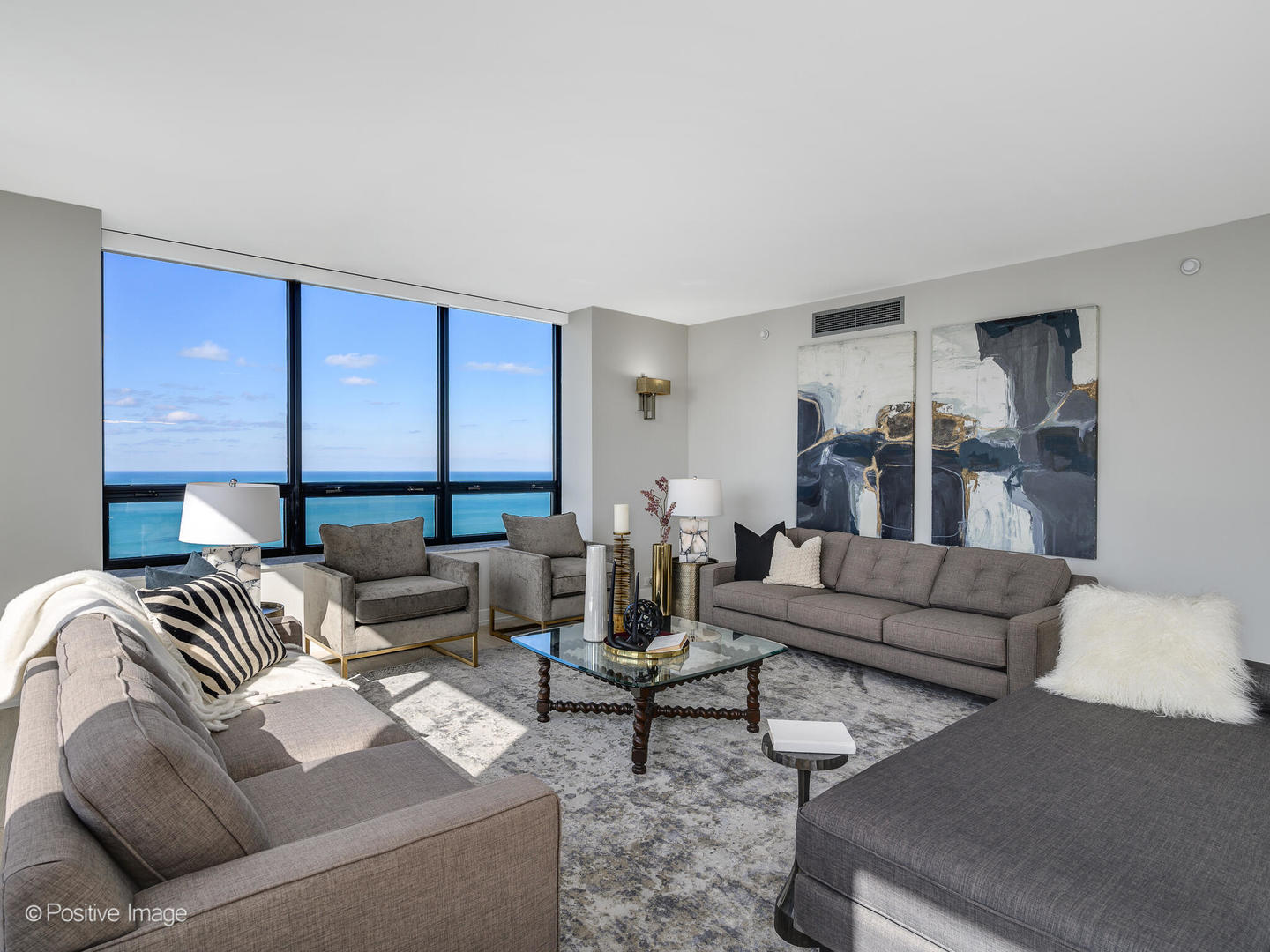 180 East Pearson Street, Unit 6501 Chicago, IL 60611 - Photo 3 of 35 a living room with furniture and a large window