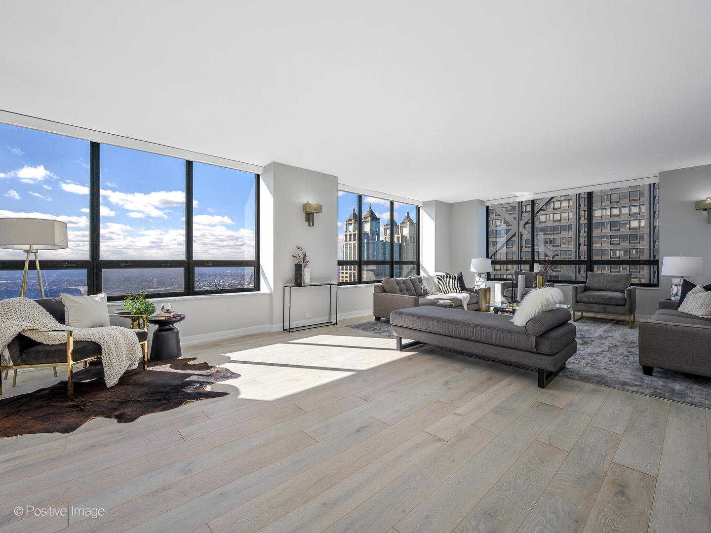 180 East Pearson Street, Unit 6501 Chicago, IL 60611 - Photo 7 of 35 a living room with furniture and a large window
