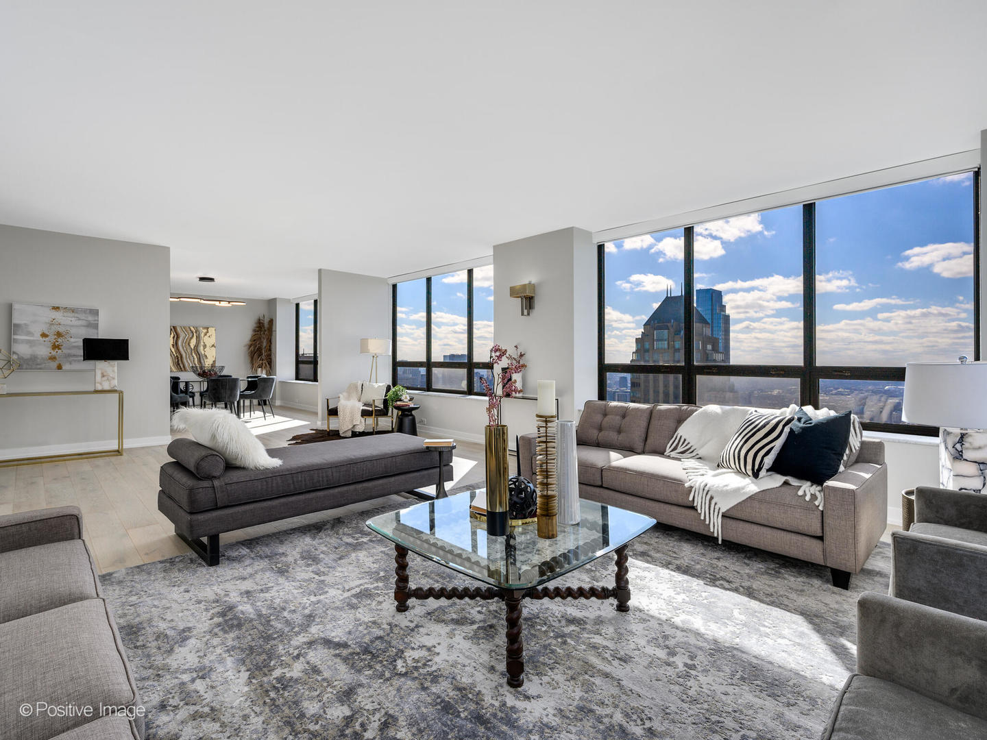 180 East Pearson Street, Unit 6501 Chicago, IL 60611 - Photo 8 of 35 a living room with furniture and a large window