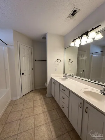 a bathroom with a bathtub